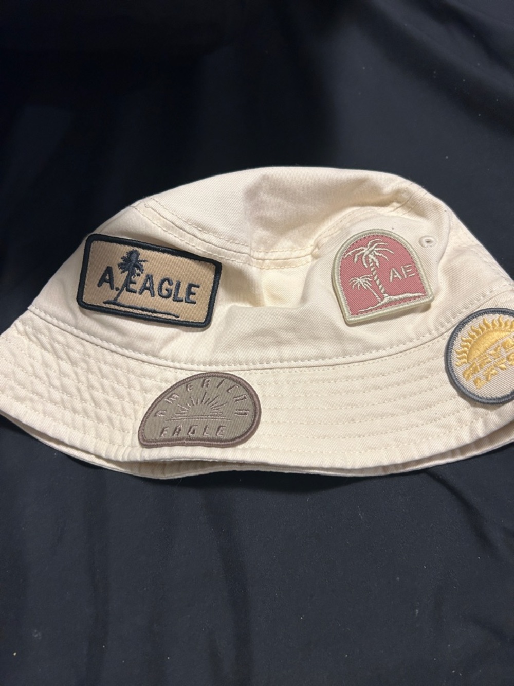American Eagle Outfitters Cream Bucket Hat with Patch Accents
